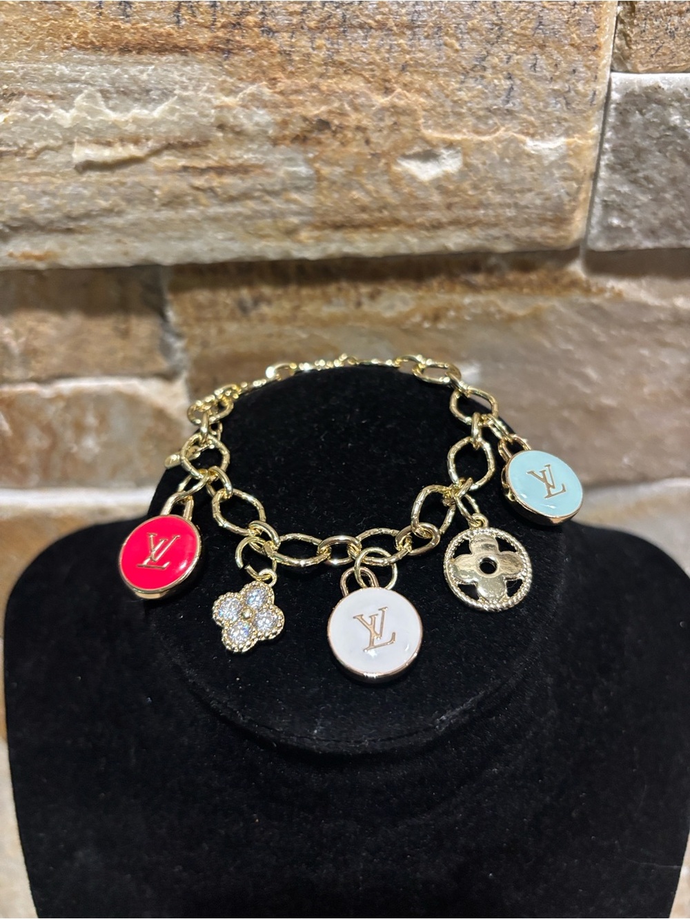 Gorgeous gold  Charm Bracelet with Red, White and Blue LV Enamel Discs